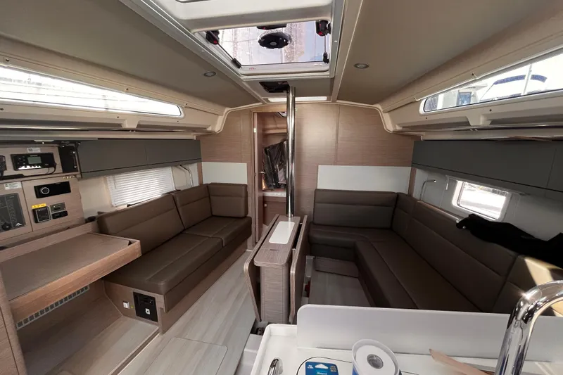 Mdr 388 #305 In Stock Yacht Photos Pics 2023 Hanse 388 yacht interior with modern seating and sleek design.