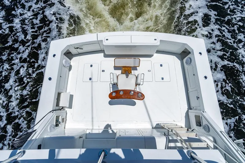 Energy Yacht Photos Pics Aerial view of 1998 Bertram 60 Convertible yacht deck on water.