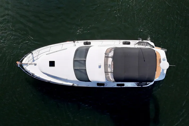 Shaneanigans Yacht Photos Pics Overhead view of a 1998 Sea Ray 400 Sedan Bridge yacht on water.