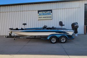2000 Ranger 522DVX Comanche boat on trailer at Ted's Boatarama, Mercury outboard.