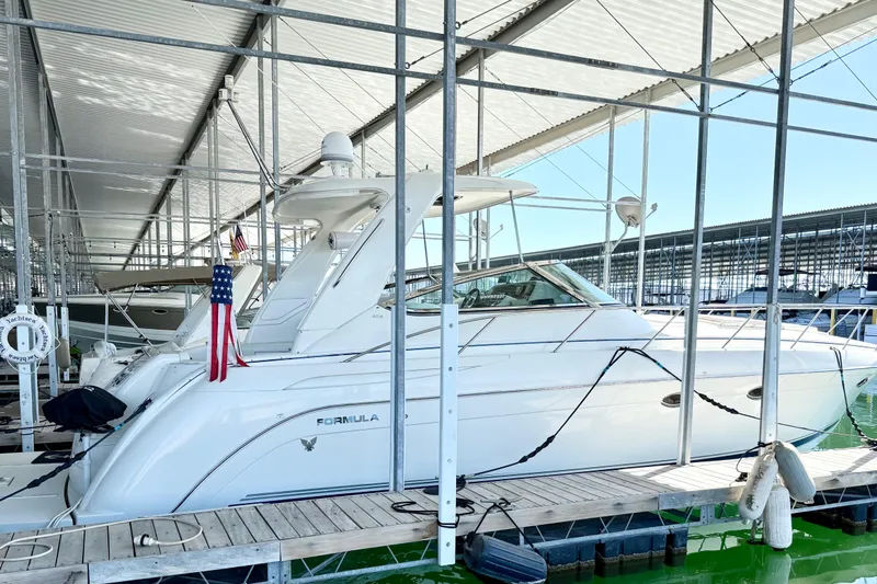 Yachtsea Yacht Photos Pics 2004 Formula 40 Performance Cruiser docked in a marina, side view.