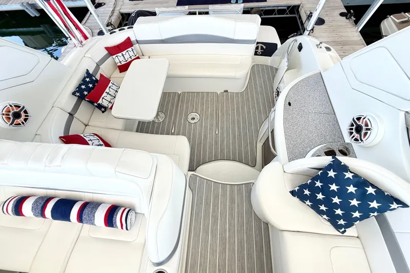 Yachtsea Yacht Photos Pics 2004 Formula 40 Performance Cruiser interior with nautical-themed cushions and sleek seating.