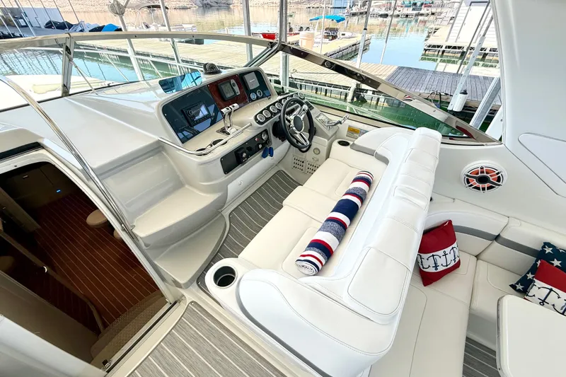 Yachtsea Yacht Photos Pics 2004 Formula 40 Performance Cruiser cockpit with white seating and nautical decor.