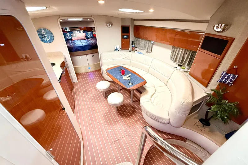Yachtsea Yacht Photos Pics Luxurious interior of 2004 Formula 40 Performance Cruiser with elegant seating and modern amenities.