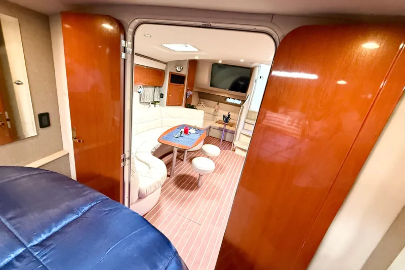 Yachtsea Yacht Photos Pics Interior of 2004 Formula 40 Performance Cruiser with seating and table.