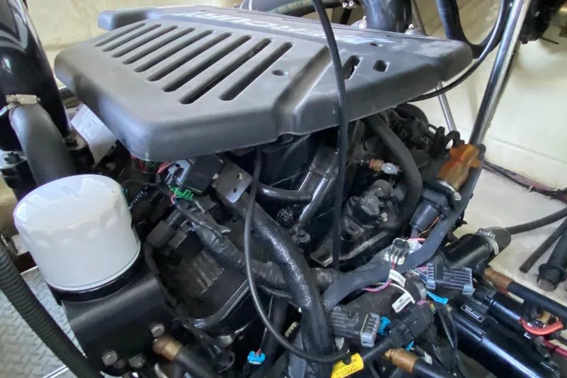 Yachtsea Yacht Photos Pics Engine compartment of a 2004 Formula 40 Performance Cruiser, showcasing intricate wiring and components.