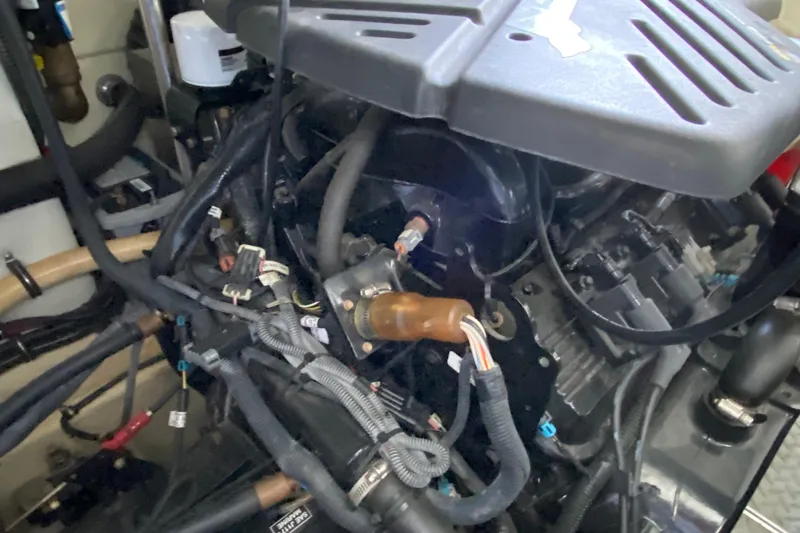 Yachtsea Yacht Photos Pics Engine compartment of a 2004 Formula 40 Performance Cruiser, showcasing wiring and components.