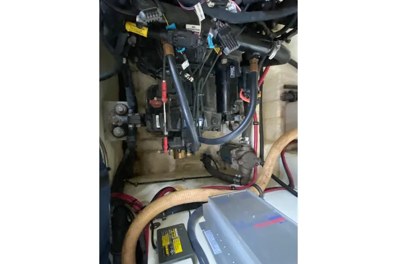 Yachtsea Yacht Photos Pics Engine compartment of a 2004 Formula 40 Performance Cruiser with visible wiring and components.