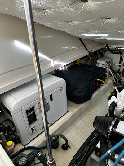 Blue Star Yacht Photos Pics Engine compartment of 2010 Back Cove 33 Hardtop Express boat, showing generator and wiring.