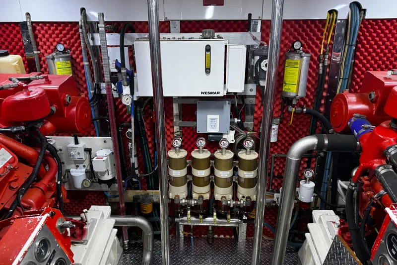 Atlantis Yacht Photos Pics Engine room of 1996 Hershine Benship 87 with Wesmar stabilizer system.