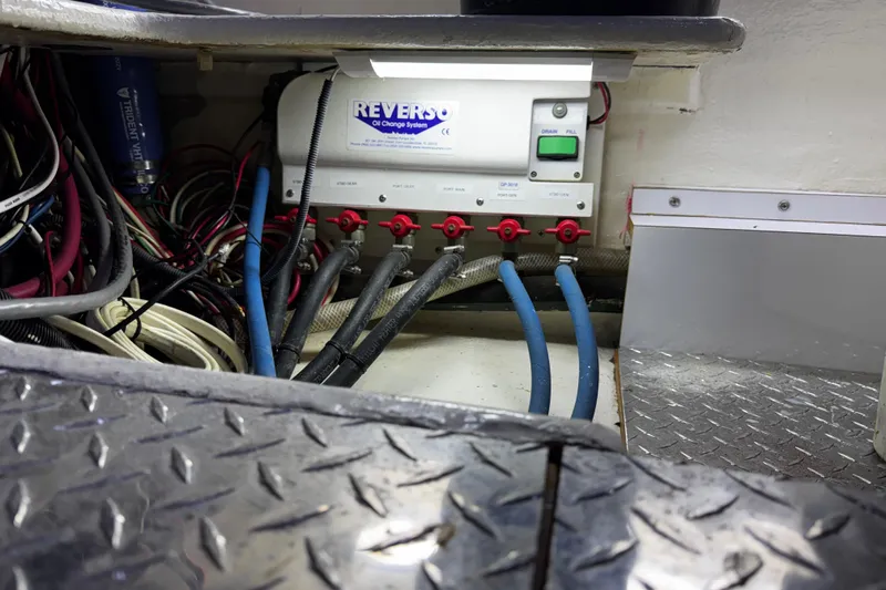 Atlantis Yacht Photos Pics Engine room of 1996 Hershine Benship 87 with Reverso oil change system.