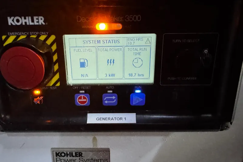 Atlantis Yacht Photos Pics Kohler Decision-Maker 3500 generator panel displaying system status and power information.