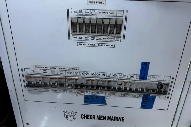 Atlantis Yacht Photos Pics Electrical panel on a 1996 Hershine Benship 87 boat, featuring labeled switches and controls.