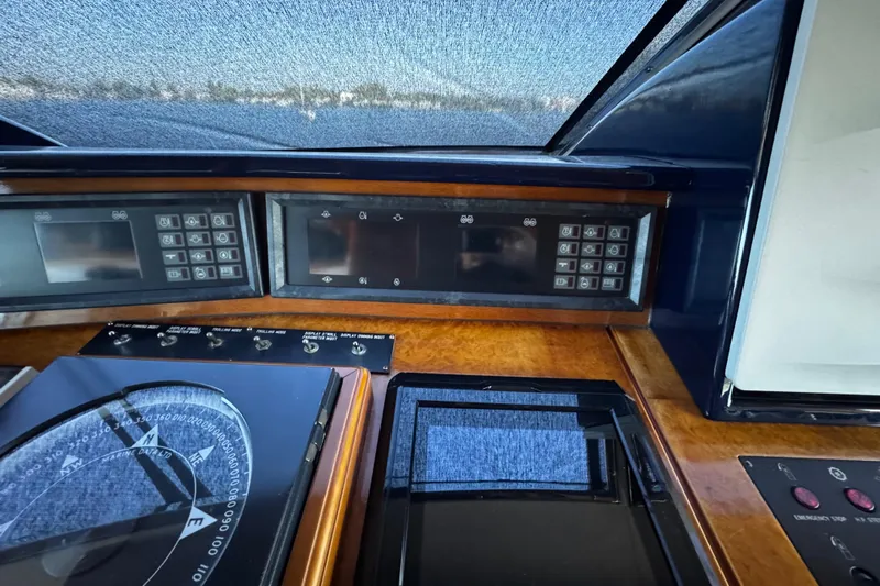 Atlantis Yacht Photos Pics Control panel of 1996 Hershine Benship 87 yacht with navigation instruments.