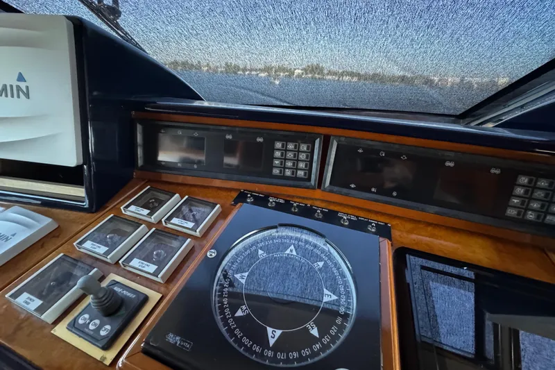 Atlantis Yacht Photos Pics Cockpit of 1996 Hershine Benship 87 yacht with navigation instruments and controls.