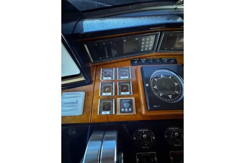 Atlantis Yacht Photos Pics Control panel of 1996 Hershine Benship 87 yacht with navigation instruments.