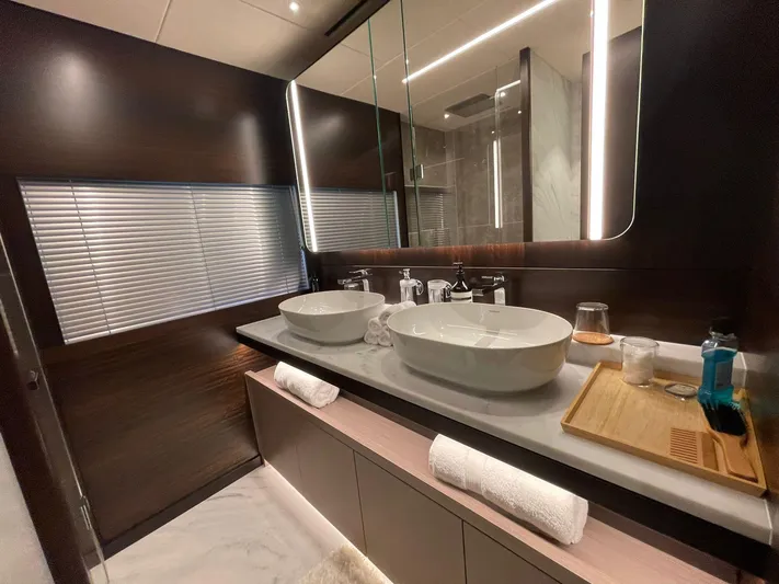  Yacht Photos Pics Luxurious bathroom on 2022 Sunseeker 88 Yacht with dual sinks and modern design.