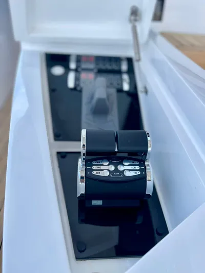  Yacht Photos Pics Control panel of a 2022 Sunseeker 88 Yacht, featuring sleek design and modern technology.