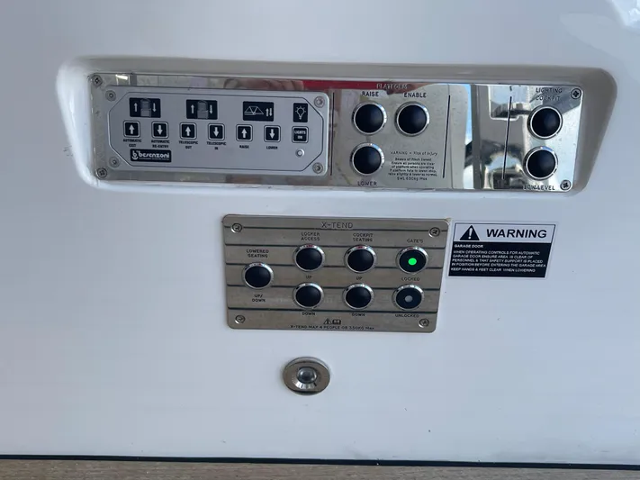  Yacht Photos Pics Control panel on a 2022 Sunseeker 88 Yacht with warning label.