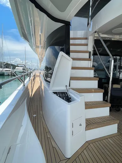  Yacht Photos Pics Sunseeker 88 Yacht 2022 deck with stairs and open storage compartment.