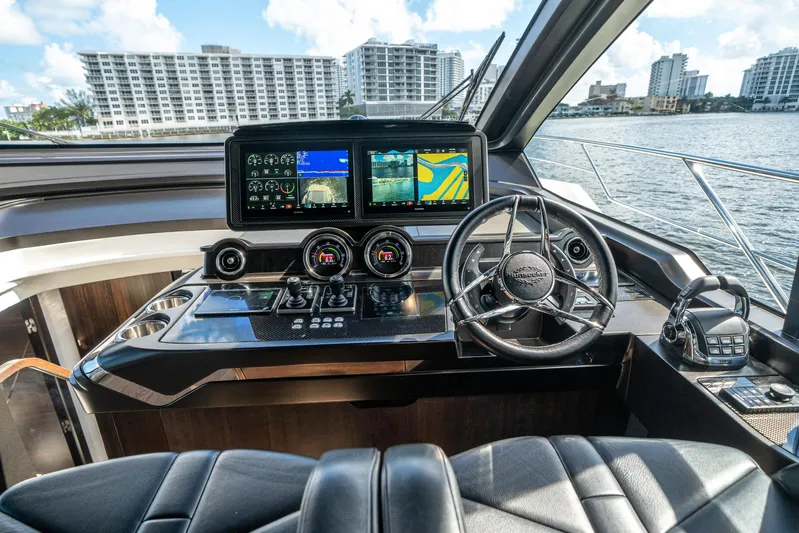 Lorena Yacht Photos Pics Cockpit of 2022 Sunseeker Predator 65 yacht with advanced navigation system.