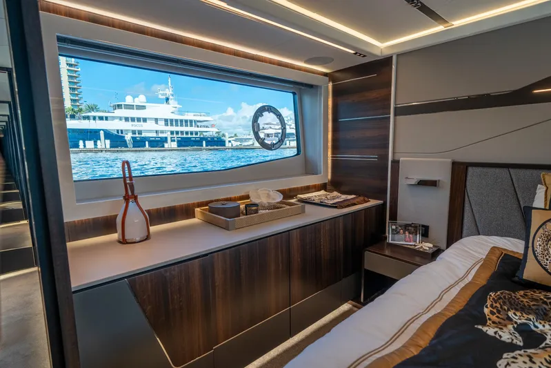 Lorena Yacht Photos Pics Luxurious interior of 2022 Sunseeker Predator 65 yacht with ocean view through window.