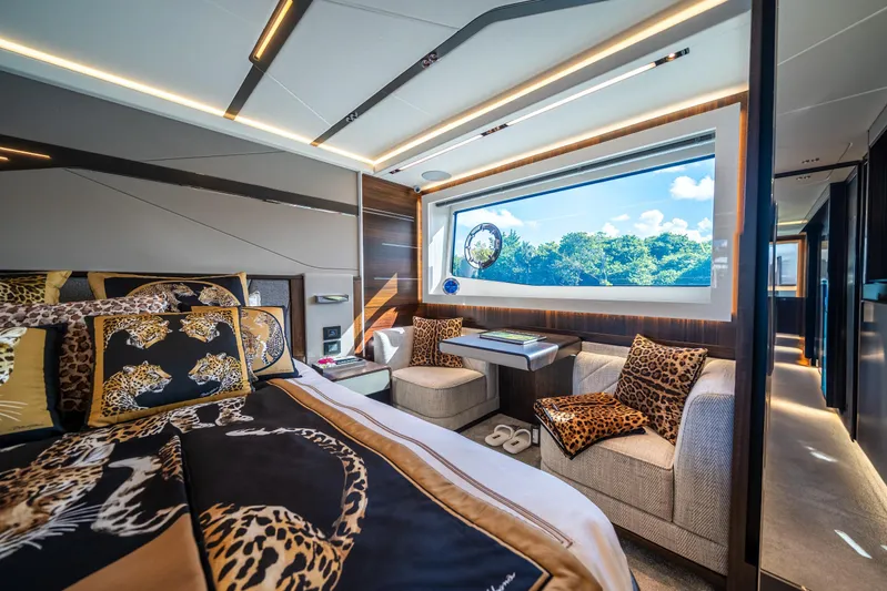 Lorena Yacht Photos Pics Luxurious interior of 2022 Sunseeker Predator 65 yacht with elegant decor and large window view.