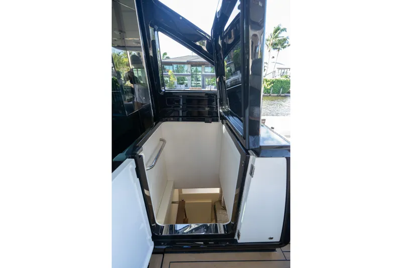 Lorena Yacht Photos Pics Stairway entrance on 2022 Sunseeker Predator 65 yacht, featuring sleek design and modern finish.