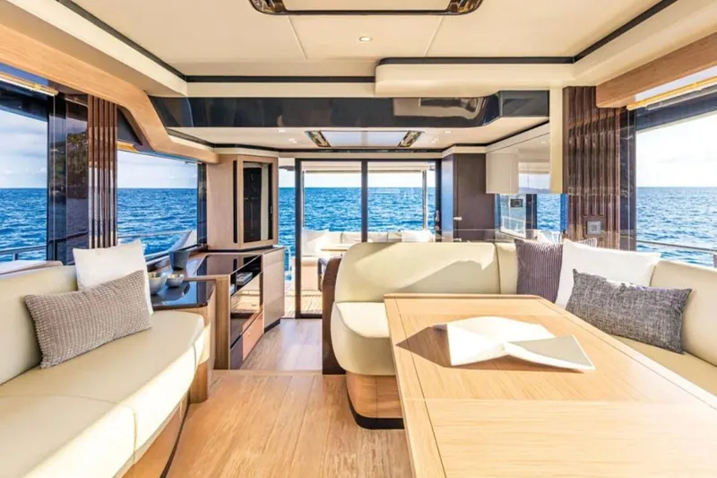  Yacht Photos Pics Luxurious interior of 2024 Absolute NAVETTA 52 yacht with ocean view.