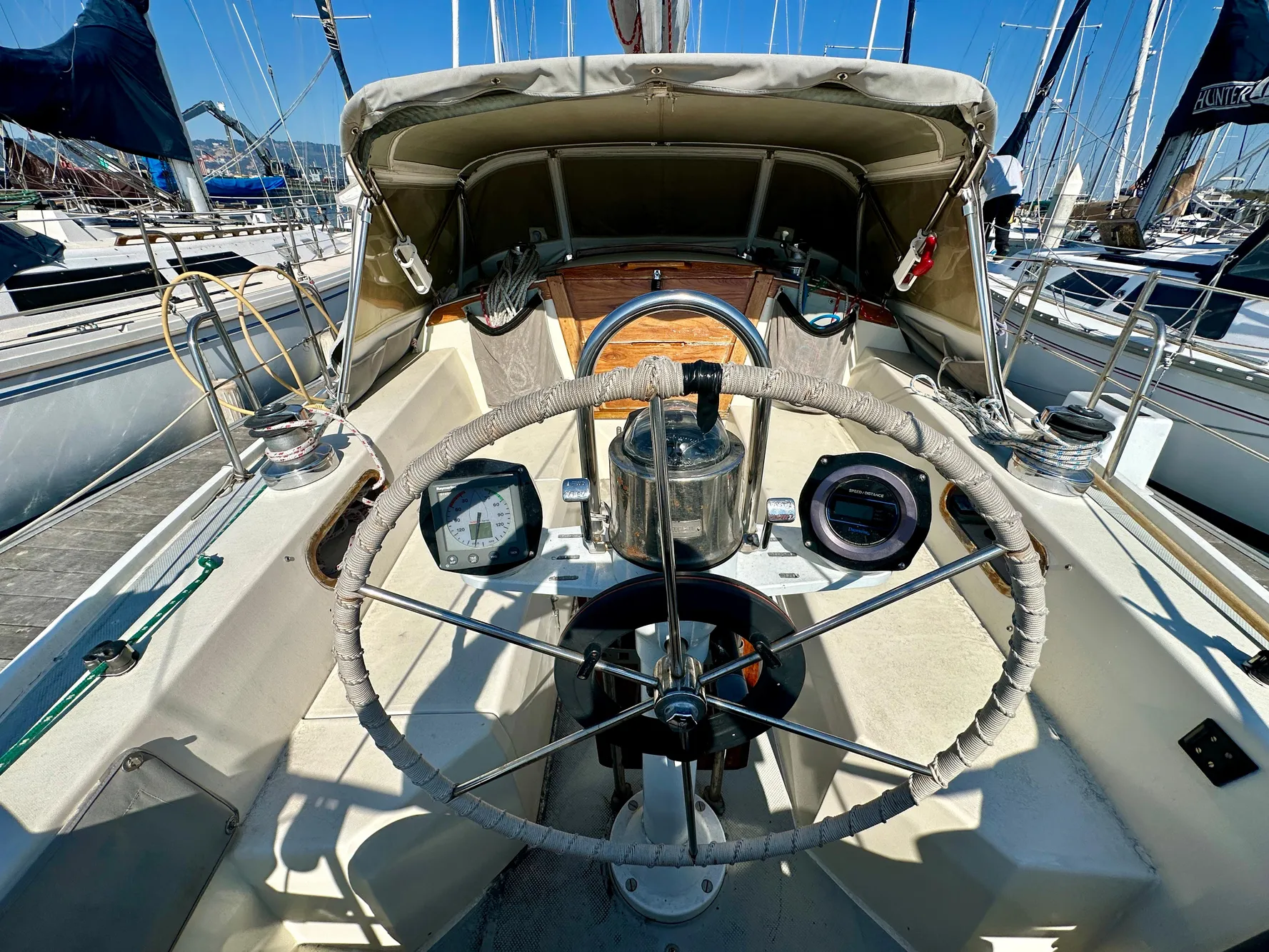 Cockpit of a 1987 Catalina 34 yacht in the marina.