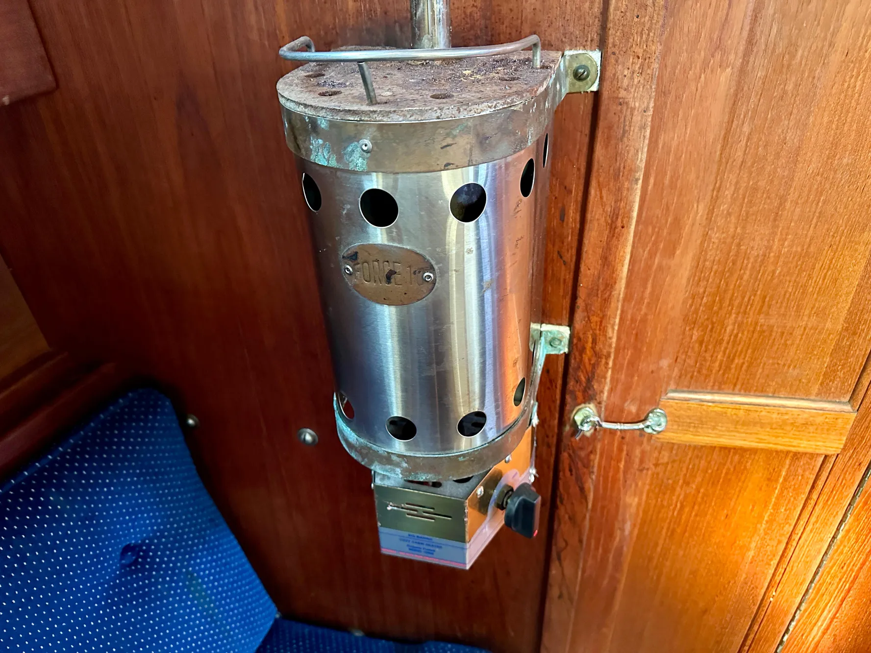 Metal heater in a 1987 Catalina 34 yacht interior.
