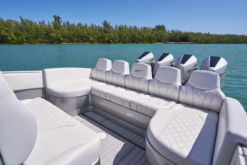  Yacht Photos Pics 2020 Midnight Express 37' Open boat with luxurious seating and multiple outboard engines.