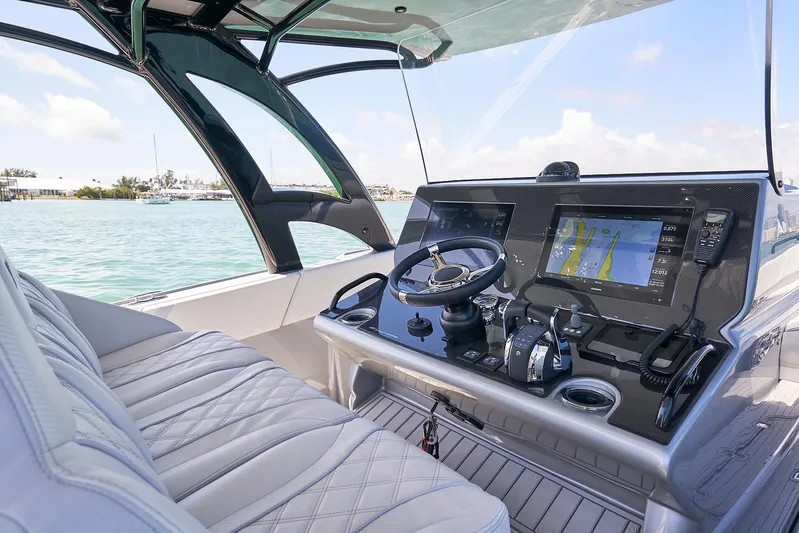  Yacht Photos Pics 2020 Midnight Express 37' Open boat cockpit with advanced navigation system.