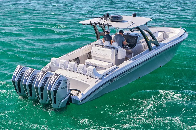  Yacht Photos Pics 2020 Midnight Express 37' Open boat cruising on turquoise waters.