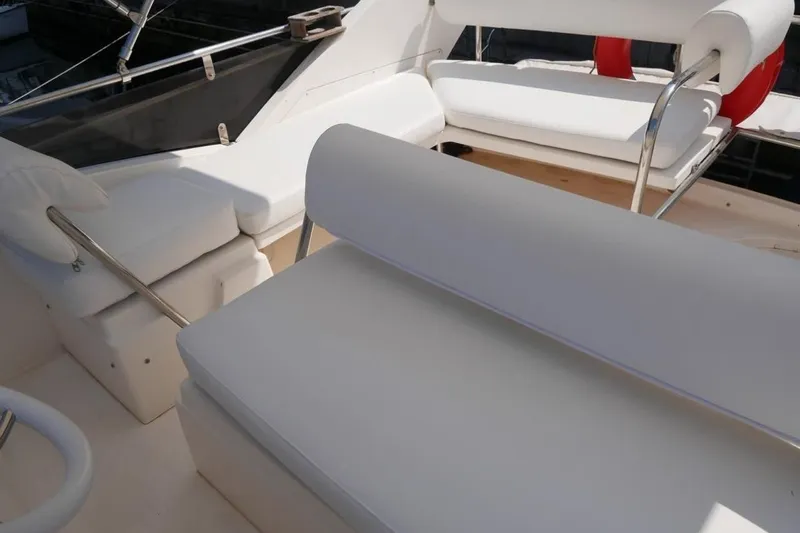  Yacht Photos Pics 1994 Fairline Phantom 37 yacht interior with white seating and sleek design.