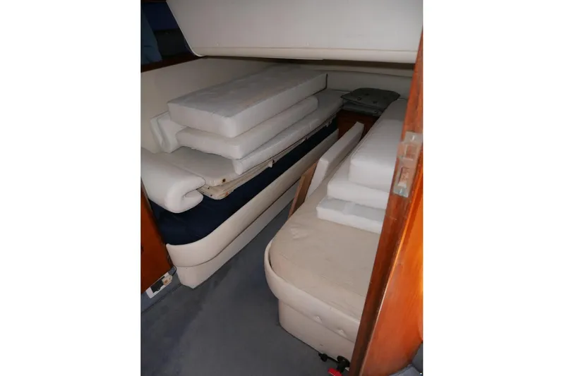  Yacht Photos Pics Interior cabin of 1994 Fairline Phantom 37 with stacked cushions.
