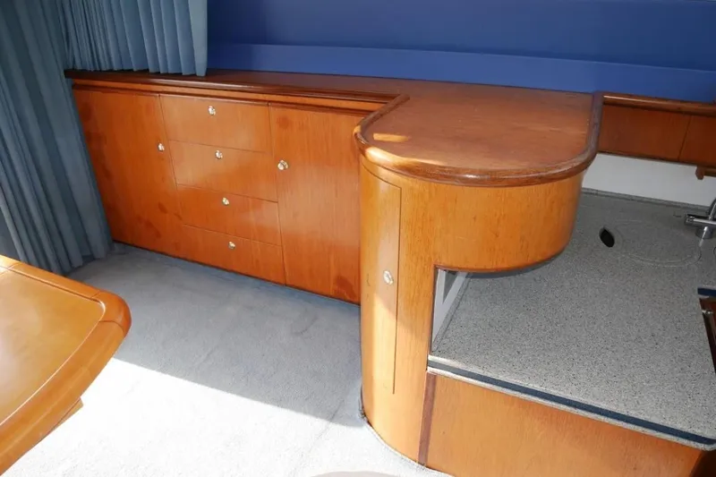  Yacht Photos Pics Interior of 1994 Fairline Phantom 37 yacht with wooden cabinetry and countertop.