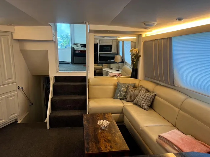 Sea Tiger Yacht Photos Pics Luxurious interior of a 1996 Viking 60 Cockpit Sport Yacht with elegant seating and decor.