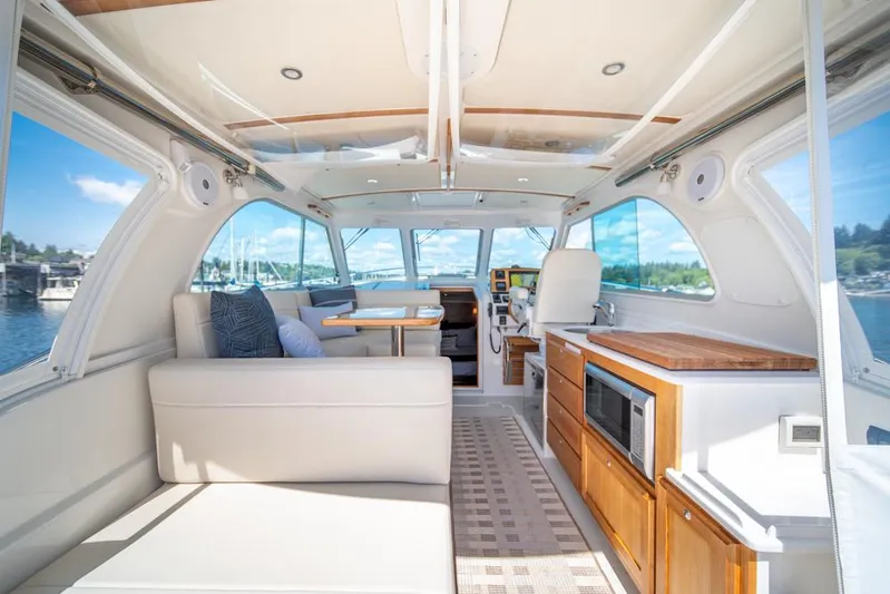 Eastern Standard Yacht Photos Pics Interior of 2021 Back Cove 34O yacht, featuring elegant seating and modern amenities.