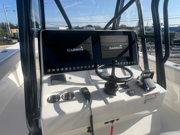  Yacht Photos Pics 2024 SeaVee 390Z boat console with dual Garmin displays and steering wheel.