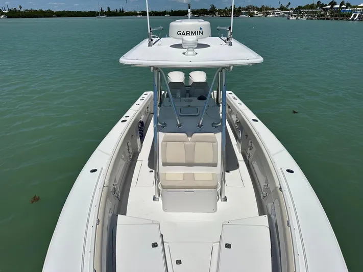  Yacht Photos Pics 2009 Jupiter 29 FS CC boat on calm water, featuring Garmin equipment.