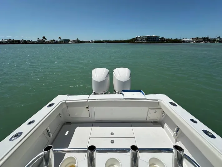  Yacht Photos Pics 2009 Jupiter 29 FS CC boat with dual engines on calm water.