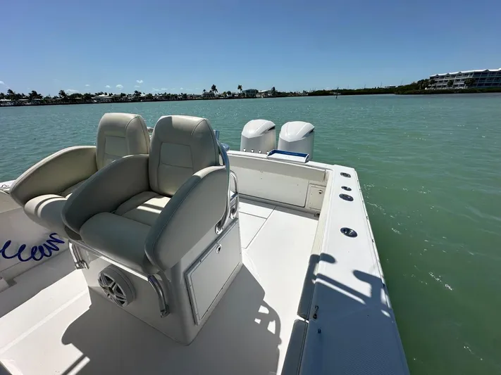  Yacht Photos Pics 2009 Jupiter 29 FS CC boat with dual engines on calm water.