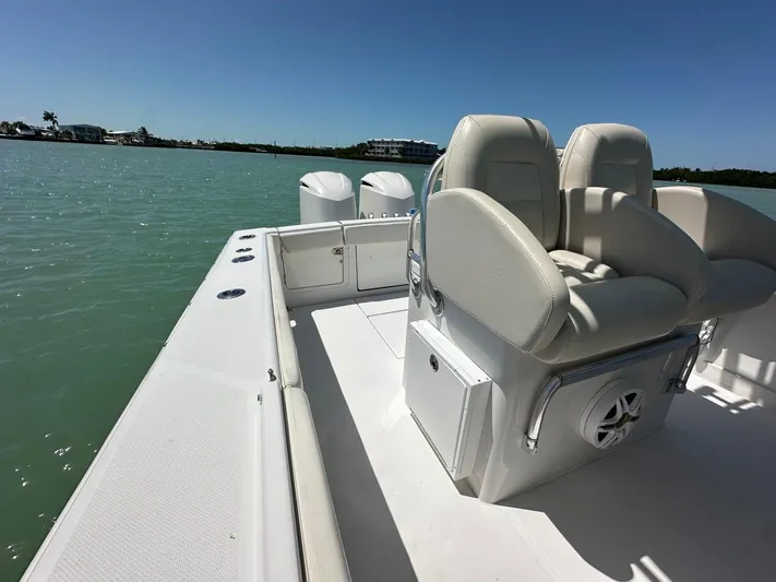  Yacht Photos Pics 2009 Jupiter 29 FS CC boat with dual seats on calm water.
