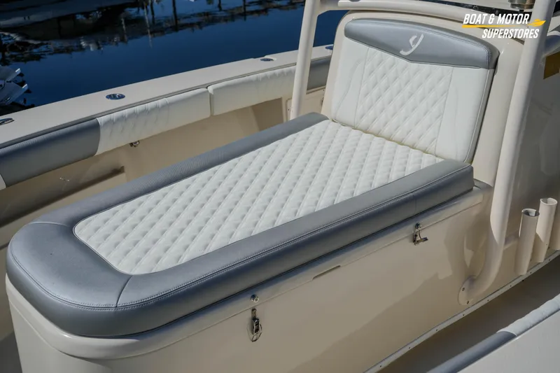  Yacht Photos Pics Luxurious seating on a 2016 Young 27 boat, featuring quilted upholstery and sleek design.