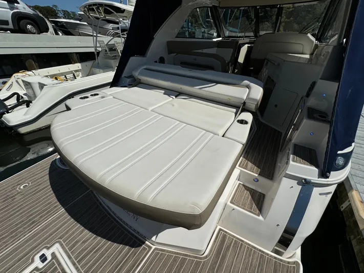 Ripple Yacht Photos Pics 2016 Regal 35 Sport Coupe boat with spacious rear seating and modern design.