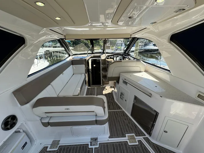 Ripple Yacht Photos Pics 2016 Regal 35 Sport Coupe interior with modern seating and sleek design.