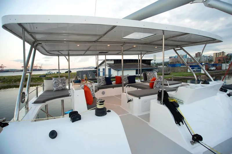 Barefeet Retreat Yacht Photos Pics Luxurious 2020 Royal Cape Catamarans Majestic 570 with spacious deck and comfortable seating.