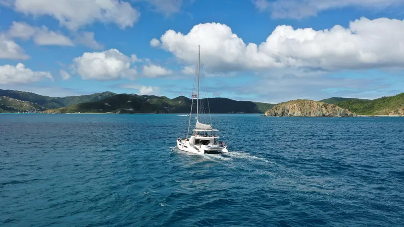 Barefeet Retreat Yacht Photos Pics Royal Cape Catamarans Majestic 570 sailing in clear blue waters, 2020 model.