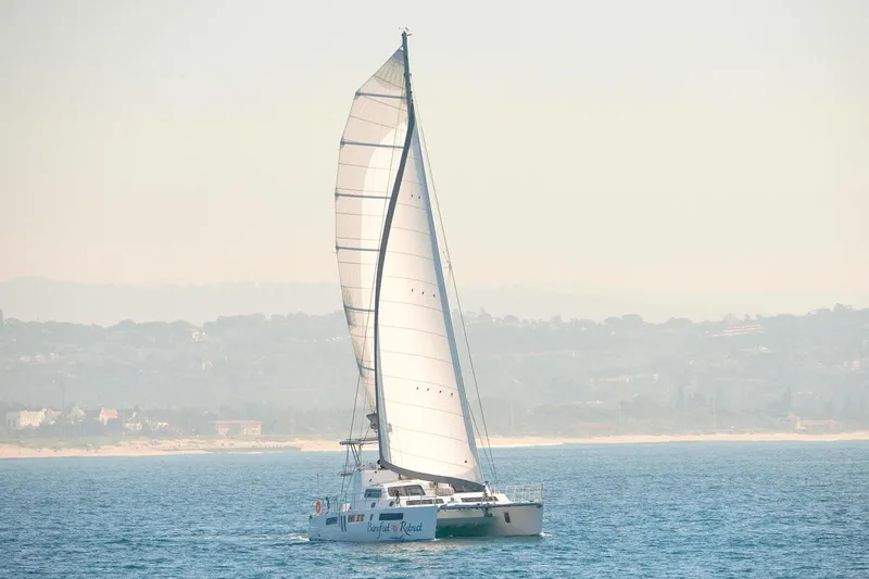 Barefeet Retreat Yacht Photos Pics 2020 Royal Cape Catamarans Majestic 570 sailing on calm waters.